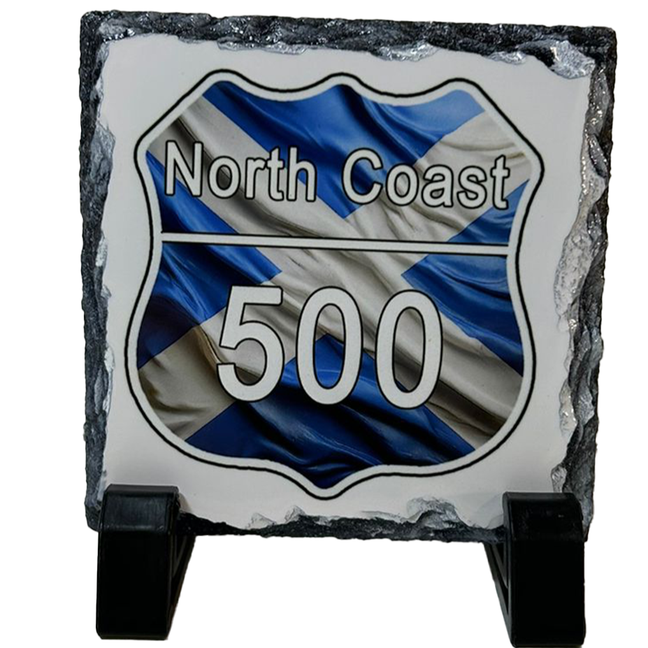 Decorative slate with 'North Coast 500' design on a white background