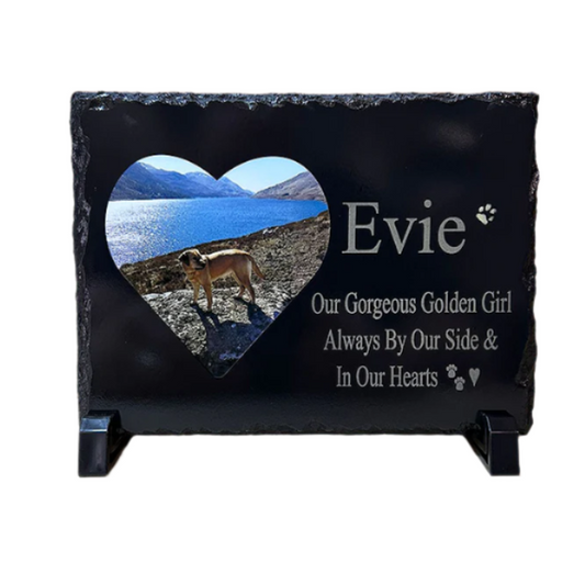 A rectangular slate with a love heart image in the center, featuring a photo and the name 'Evie'. It stands upright with a message on the bottom.