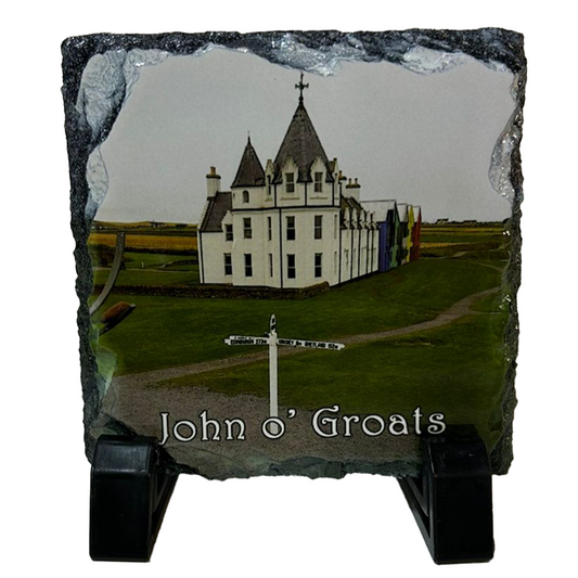 Slate with a printed image of a hotel and 'John o' Groats' text on a white background