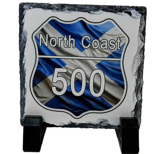 Decorative slate with 'North Coast 500' design on a white background